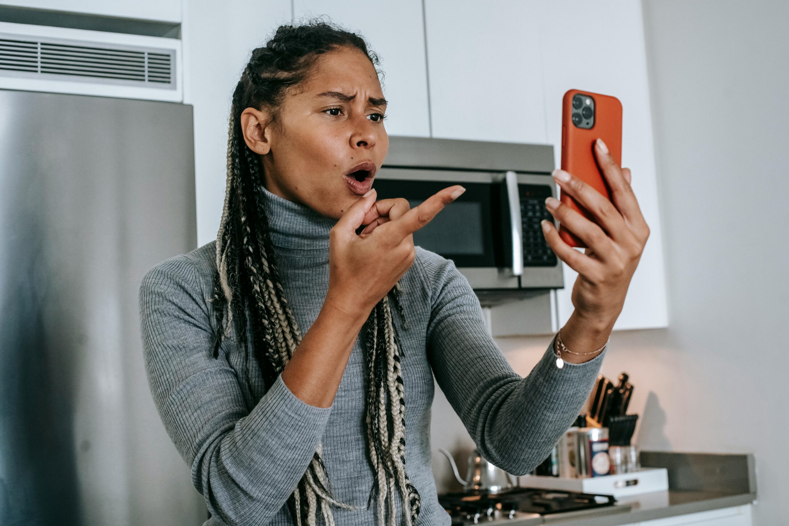 Angry Woman on cellphone talking to debt collector